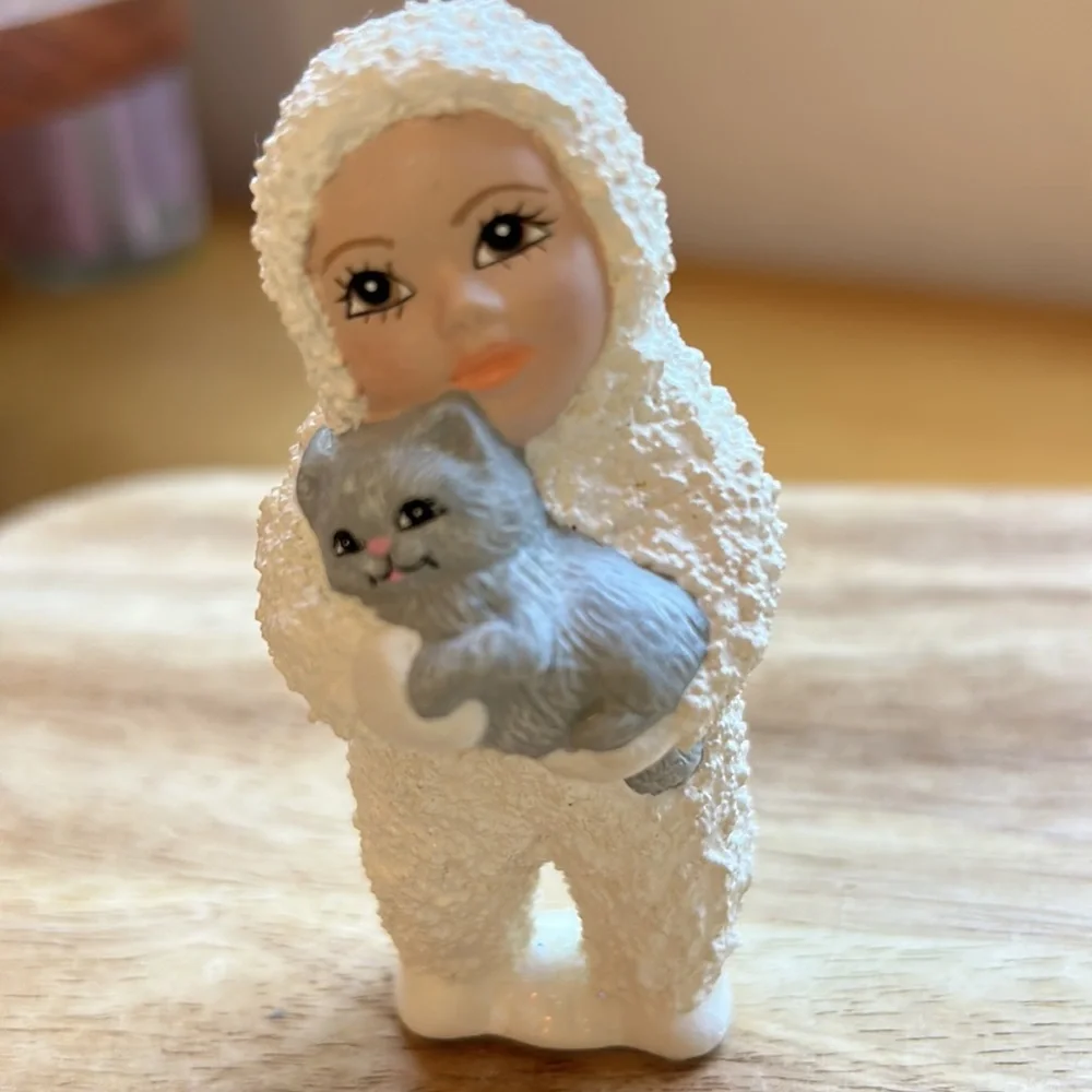 Vintage Miniature Ceramic Eskimo Like Figure Holding A Gray Kitty Cat Figurine
